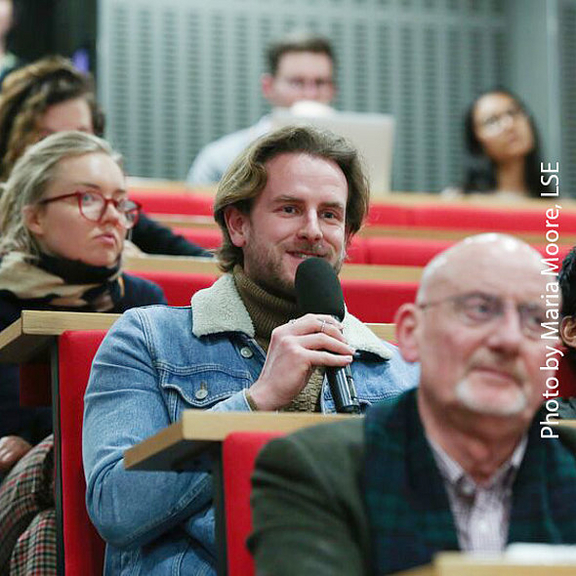 Audience member reacts in a lecture