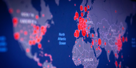Map of the world with COVID hotspots, credit Unsplash