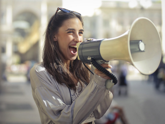 Woman with loud speaker