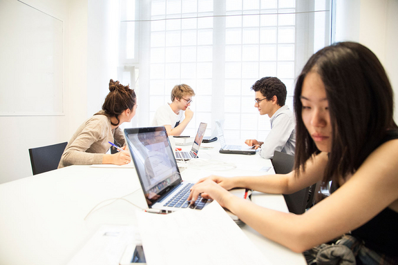 Students at Bocconi University engaged in academic work