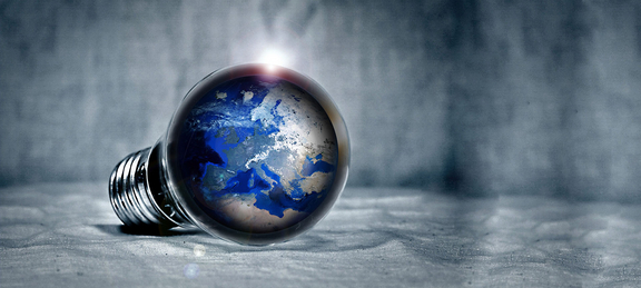 Illustration, light bulb with map of the world in the centre